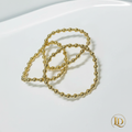 Lumiere Gold Stack - polished gold bead bracelets