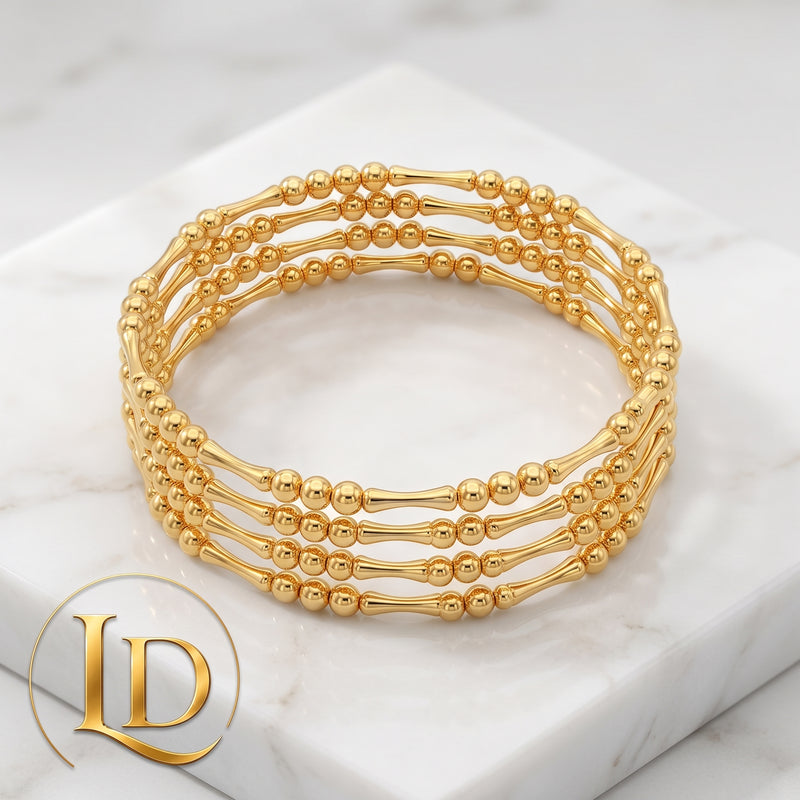 18 Karat Gold Ball & Straw (Elastic) - 0.8g per piece