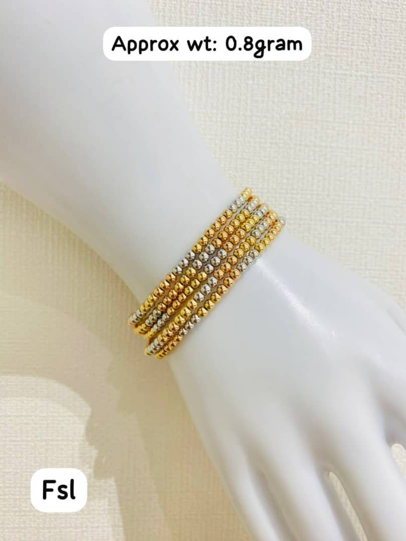 3 toned 18 Karat Gold Ball (Elastic) - 0.8g per piece