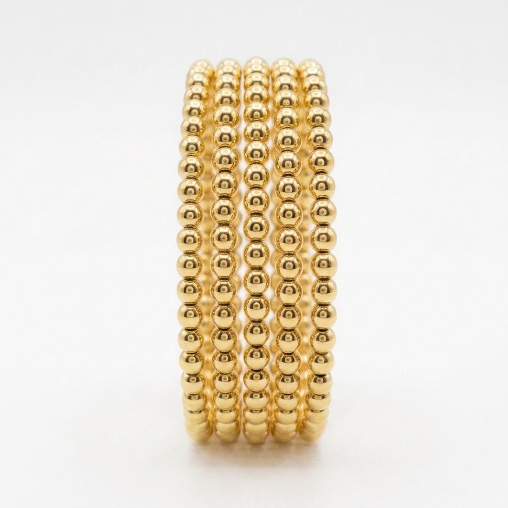 18 Karat Gold Ball Elastic Bracelet (Exclusive) - 0.8g per piece